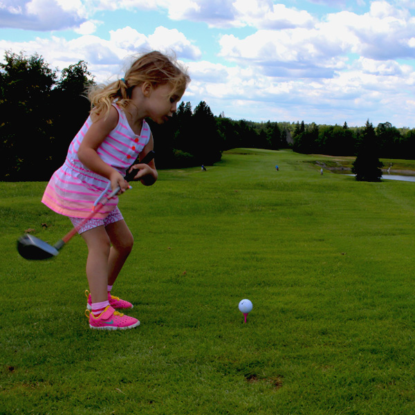 Golf, girl golfer, swing, tee shot, cute kid, sunny day